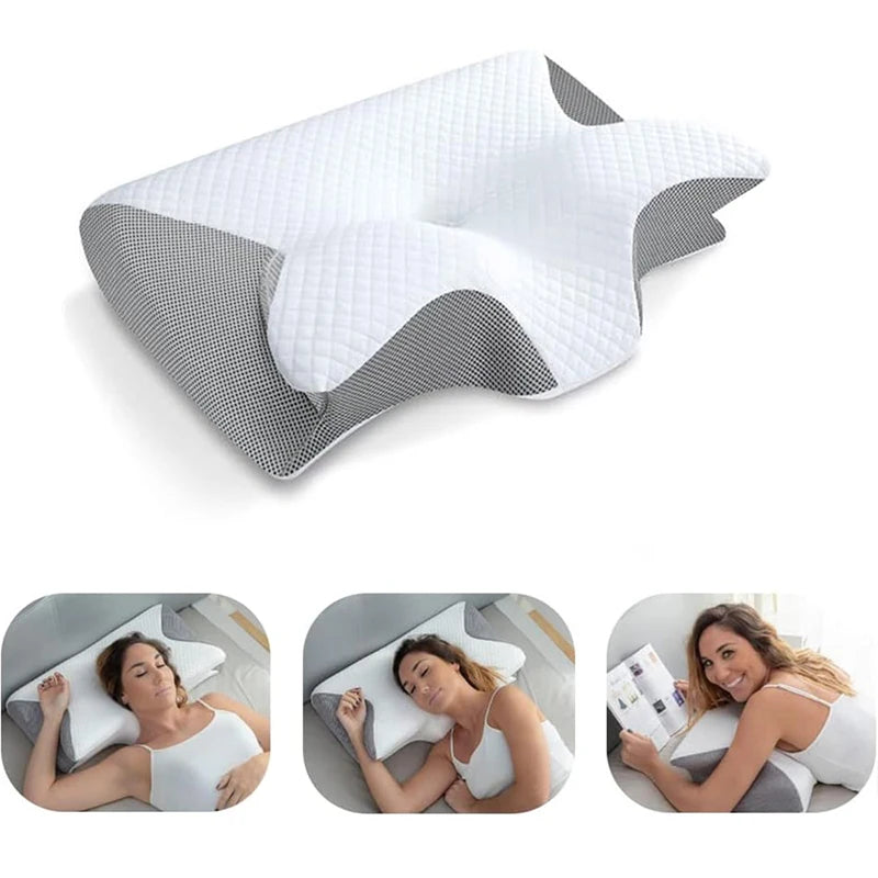 Oreiller ergonomique contourné blanc avec housse matelassée et côtés en maille noire ; creux central et supports latéraux visibles.