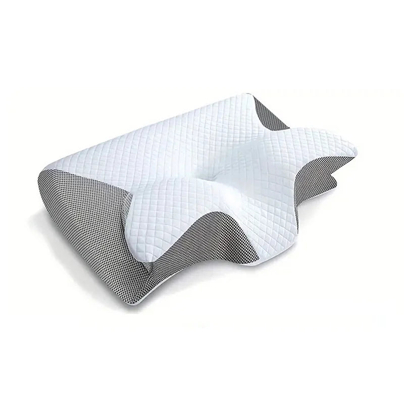 Oreiller ergonomique contourné gris avec housse matelassée et côtés en maille noire ; creux central et supports latéraux visibles.